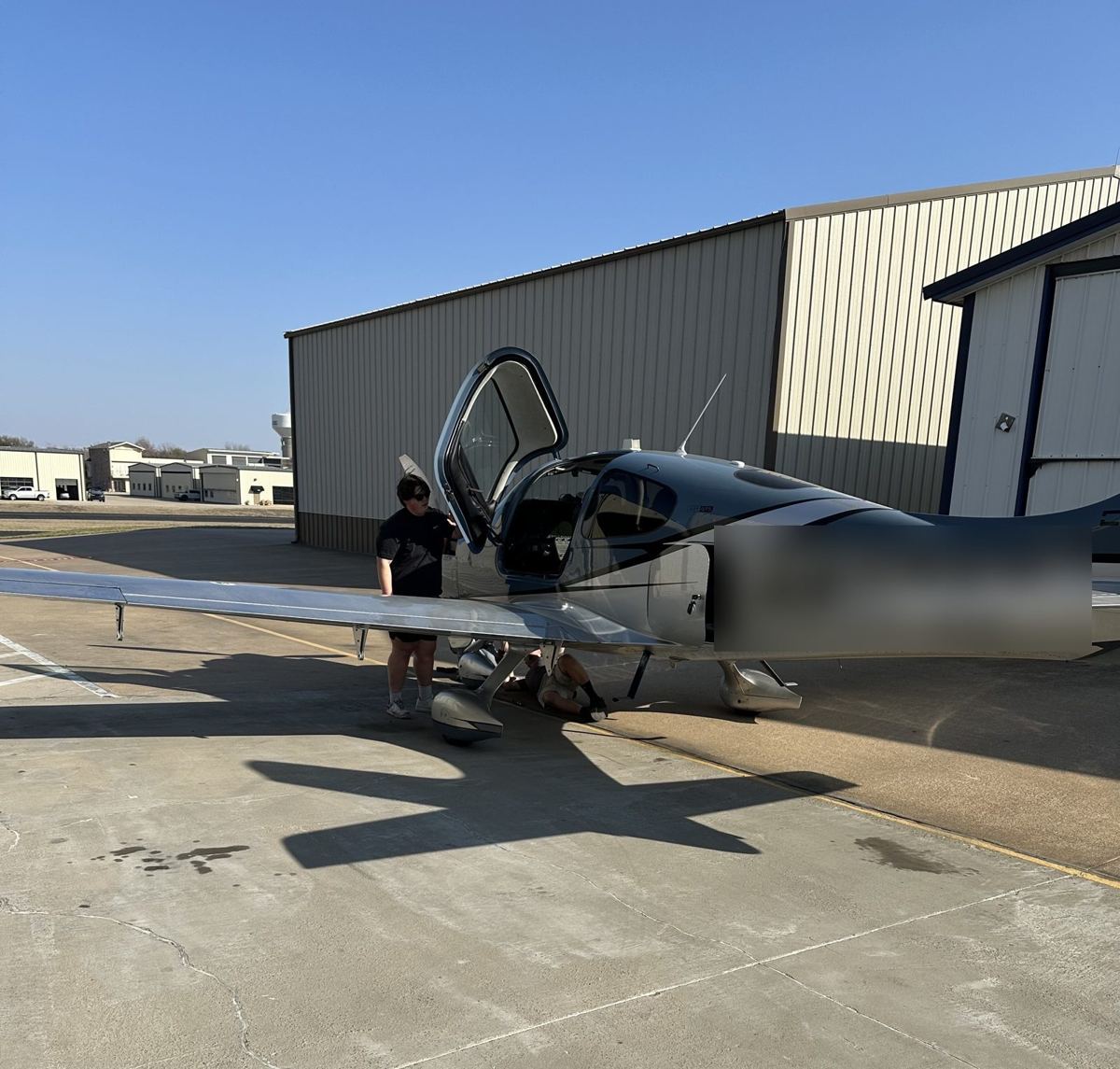 Cirrus SR-series on the ramp for maintenance at Aero Country Airport (T31)